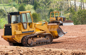 Tractors Clearing the Area